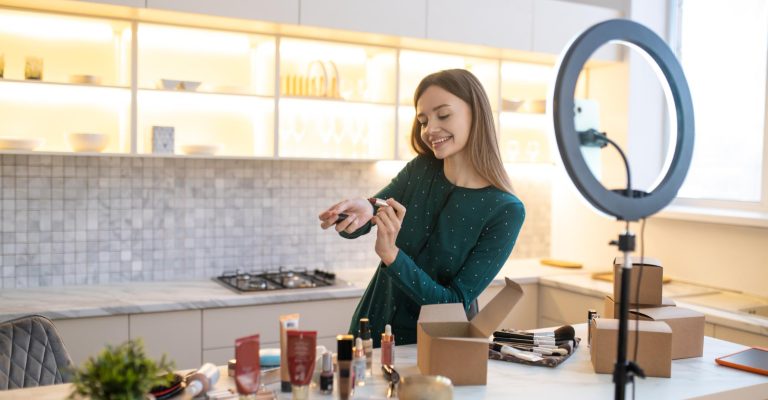 neutral photo, where can see packaging of cosmetic Girl in neutral photo, where can see packaging of cosmetic